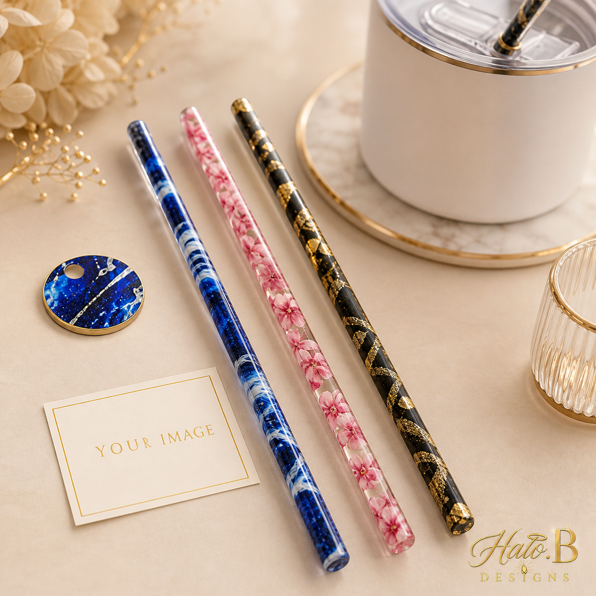 Customized image tumbler straws in blue marble, pink floral, and black gold designs