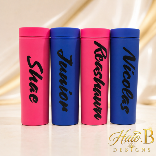 Four personalized name tumblers displayed together
