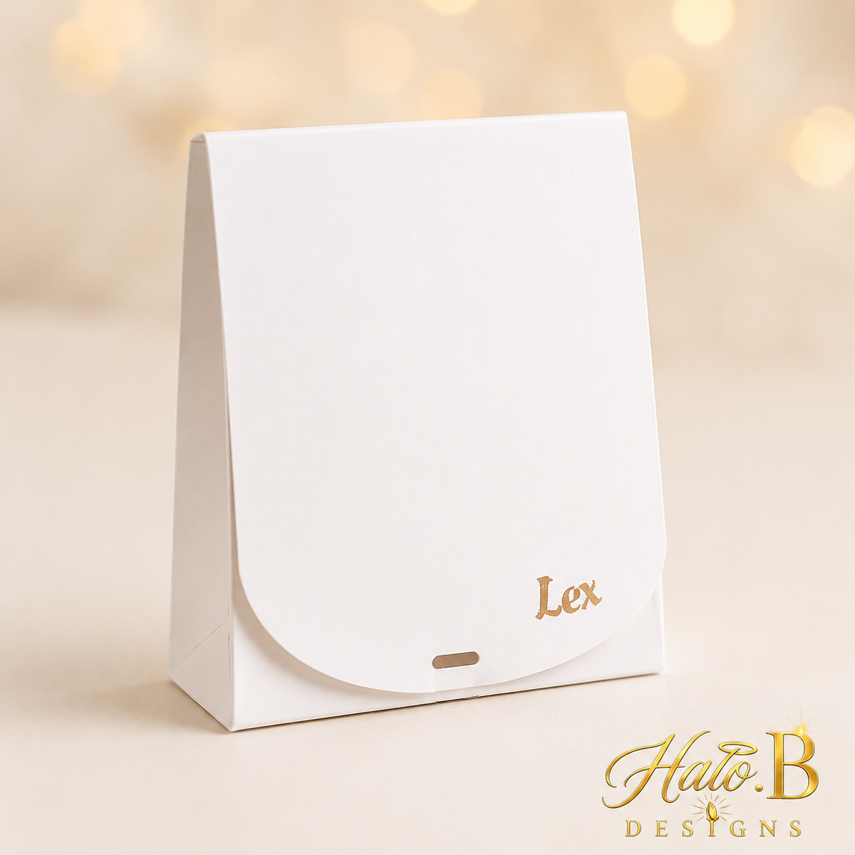 Personalized white gift bag with gold name